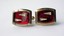 3245 c. 1940s Barrel shaped setting with red Lucite and white diamond shaped faceted inserts. Some wear to bezel, but these are just plain funky and scream 1940s! I had to include them! No maker’s mark. Medium size, approx. ¾” x ½". Price: $20