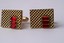 3250 c. 1940s Honeycomb texture gold tone cufflinks with three faux faceted rubies. Very nice condition. No maker’s mark. Medium size, approx. ¾” x ½”. Price: $25
