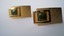 3341 c. 1960s Swank very stylized rectangular convex cufflinks. Face is textured and polished ‘window’ contains green stone. Classy! Medium, c. 1” x ½” Price: $25