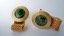 3411 c. 1960s Destino wrap jade and gold tone cufflinks. Beautiful Florentine border. Like new. Mediums size, face is c. 7/8” diameter. Price: $35