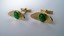 3427 c. 1950s Modern stylized concave oblong cufflinks with green ‘stone’ and textured background. No maker’s mark. Nice shape. Size: Small, c. 11/8” x 5/8” Price: $10