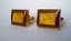 3430 c. 1960s Dante rectangular gold tone cufflinks with textured gold and amber tone face. Beautiful and a bit unusual. Medium size, c. 7/8” x ¾”. Price: $35