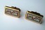 4352 c. 1960s Victoria Flemming ‘stockmarket’ cufflinks. Slight evidence of wear especially on the gold tone border; Med/Large: a little over 1”x1/2” Price: $65