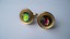4418 c. 1960s Swank round gold tone cufflinks w faceted multi-hued borealis center stone with rope border, brushed background w polished edged; Med/Large c. ¾” in diameter. Like new. Price: $25