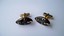 4420 c. 1950s Swank primitive mask cufflinks. Some paint loss. Small. Price: $15