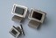 4425 c. 1960s Dante rectangular silver tone wrap cufflinks. Medium size: face measures ¾”x1/2”. Black center stone likely onyx. Comes w matching tie tack. Price: $30